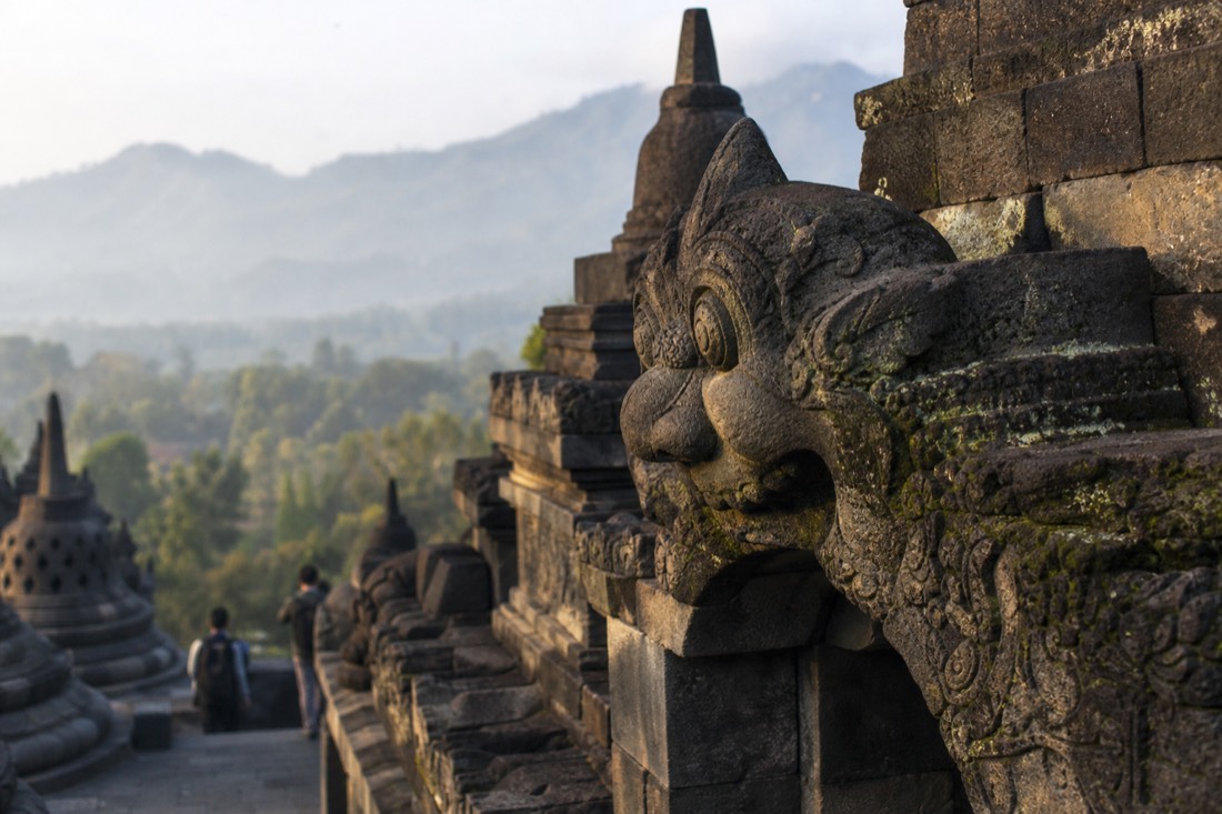 Carved kala head above a gateway of Borobudur temple