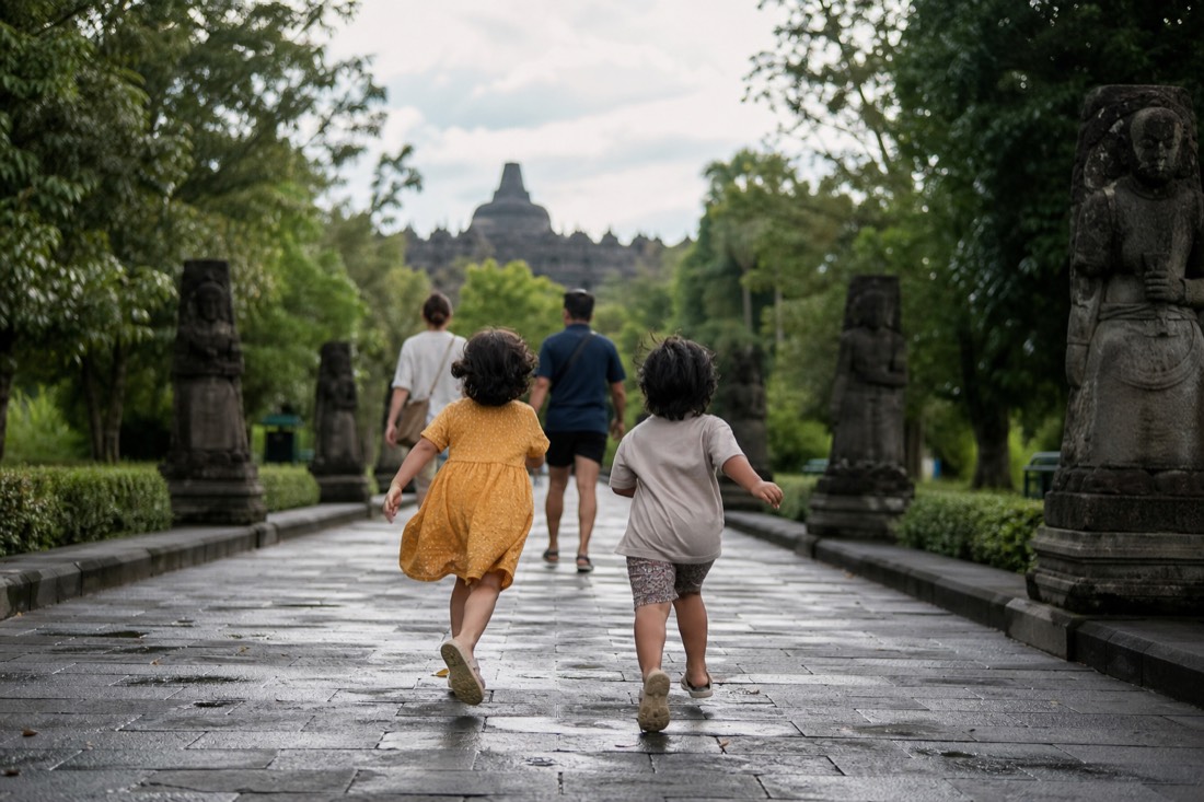 Children on the approach avenue to Borobudur
